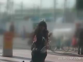 Marvelous Japanese cutie Masturbates With Dildo On Her Bike